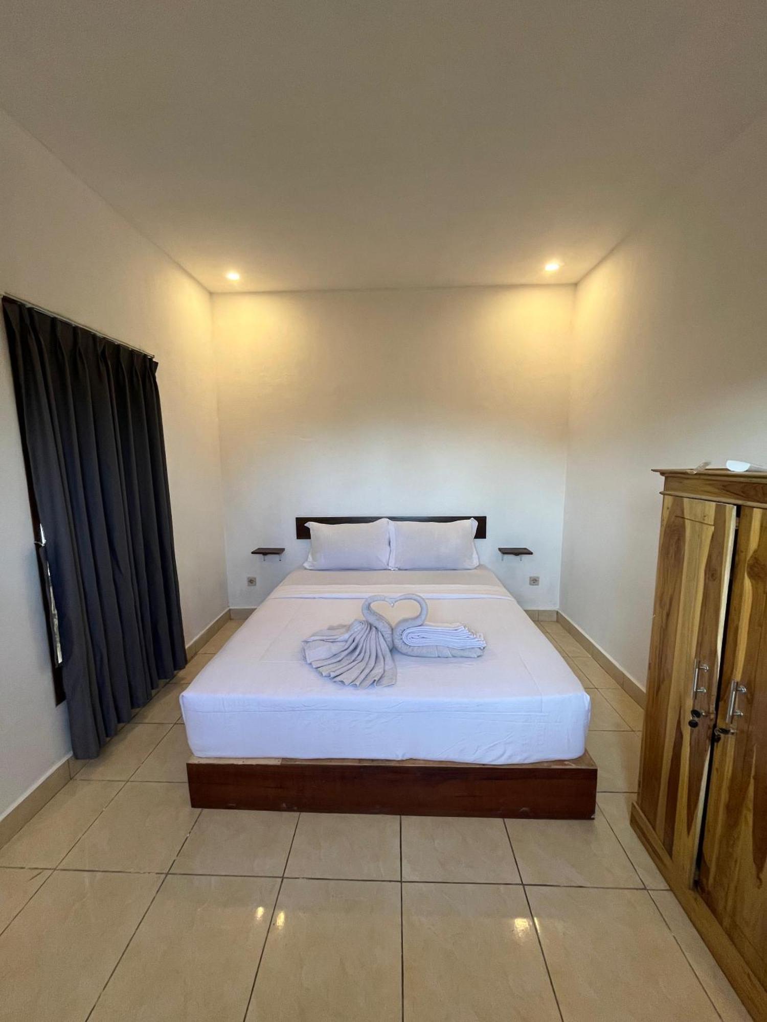 Roby Homestay Kuta  Habitación foto